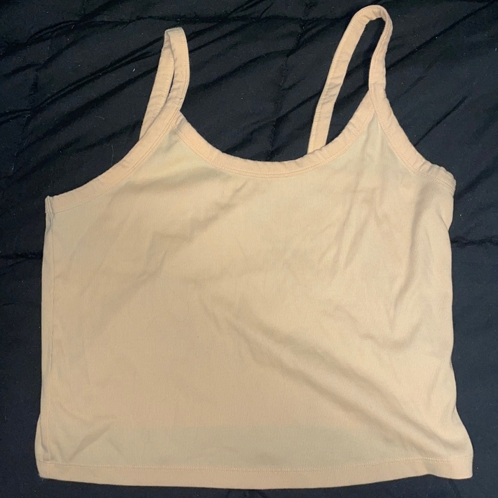 A pastel orange tank top